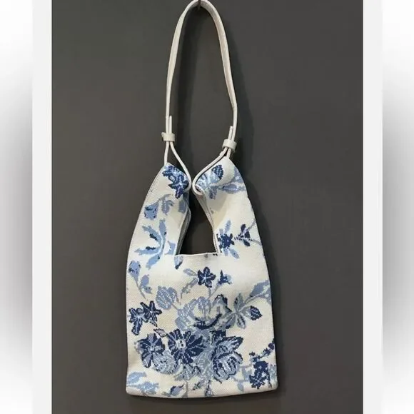 The Lucca Make It Mini Clutch is a knitted bag with a unique unstructured design - Picture 3 of 6